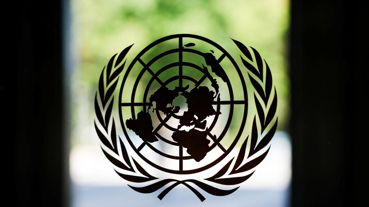 The United Nations logo adorns a window at U.N. headquarters in New York City, U.S., September 18, 2025. REUTERS/Jeenah Moon