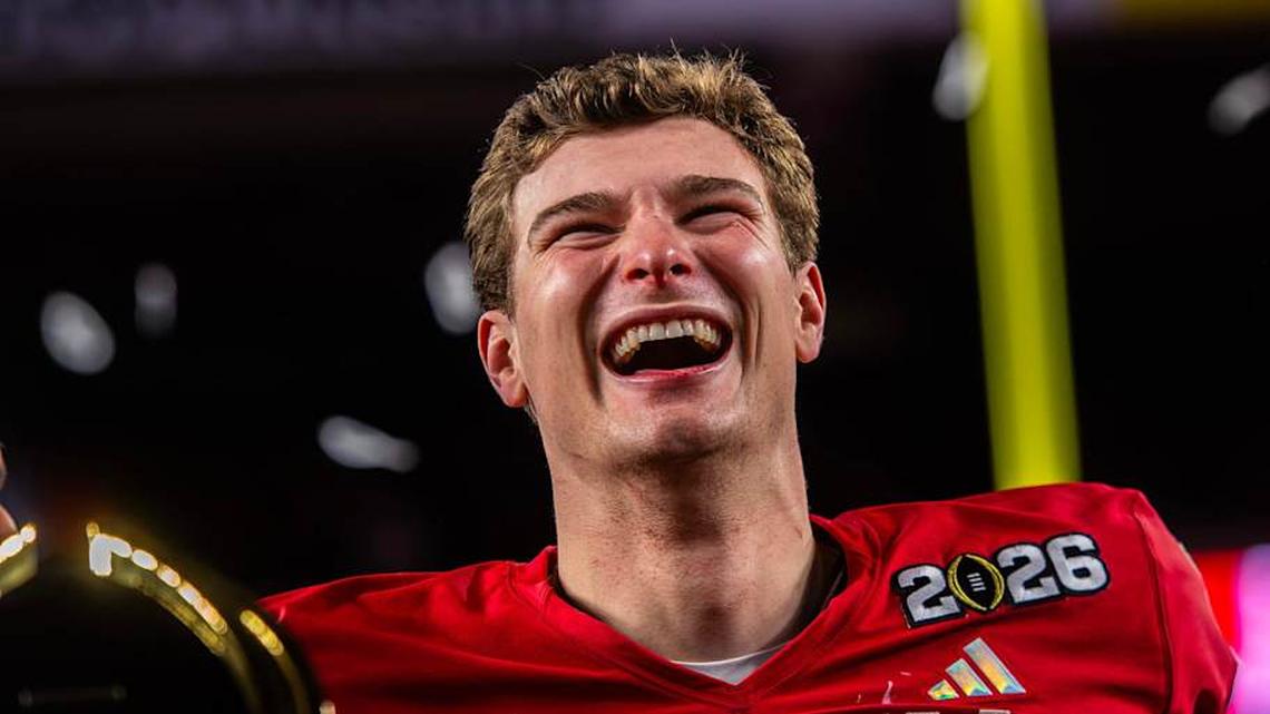  Indiana's Fernando Mendoza (15) smiles on the podium after the College Football Playoff National Championship college football game at Hard Rock Stadium in Miami Gardens on Monday, Jan. 19, 2026. | Rich Janzaruk/Herald-Times / USA TODAY NETWORK via Imagn Images 
