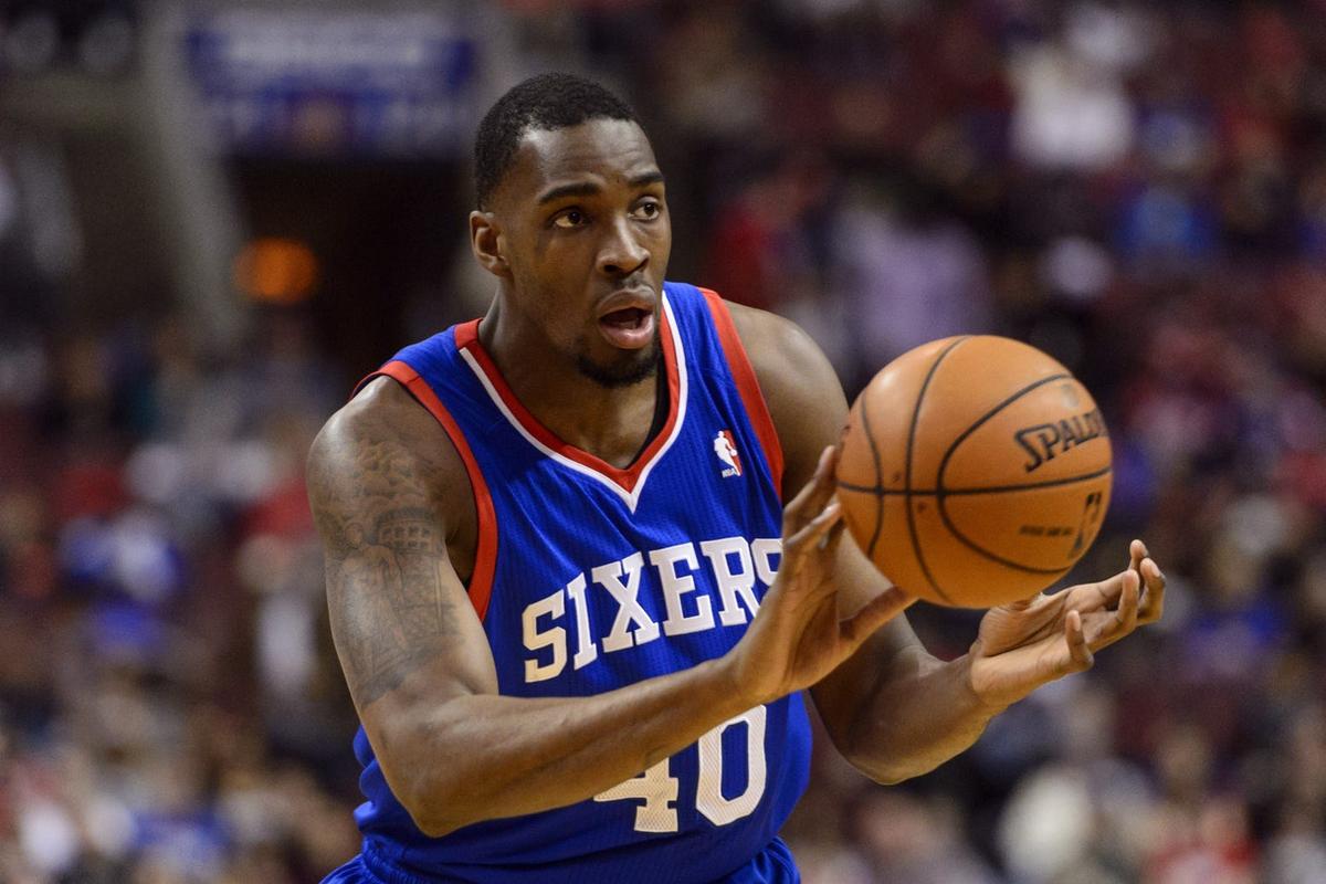 Apr 5, 2014; Philadelphia, PA, USA; Philadelphia 76ers forward Jarvis Varnado (40) passes the ball during the first quarter against the Brooklyn Nets at the Wells Fargo Center. The Nets defeated the Sixers 105-101. Mandatory Credit: Howard Smith-USA TODAY Sports