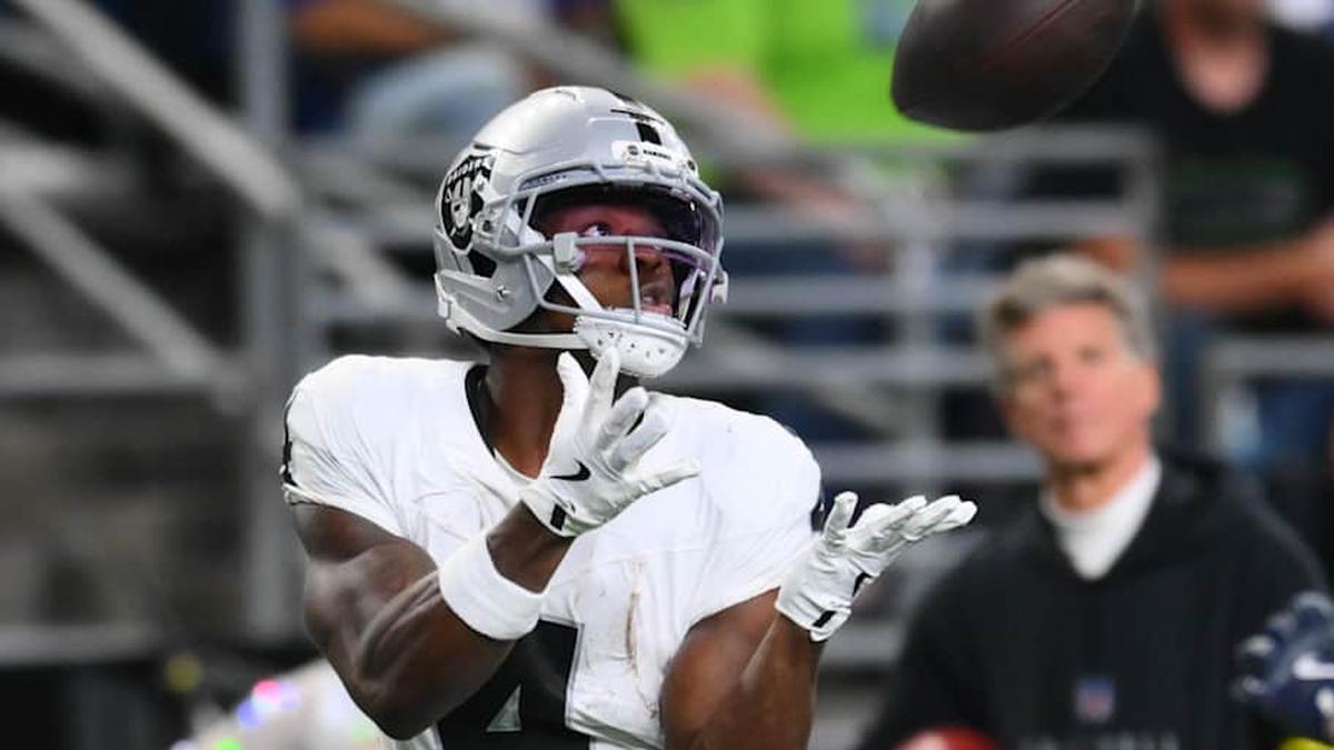  Aug 7, 2025; Seattle, Washington, USA; Las Vegas Raiders wide receiver Shedrick Jackson (4) catches a pass for a touchdown against the Seattle Seahawks during the second half at Lumen Field. Mandatory Credit: Steven Bisig-Imagn Images | Steven Bisig-Imagn Images 