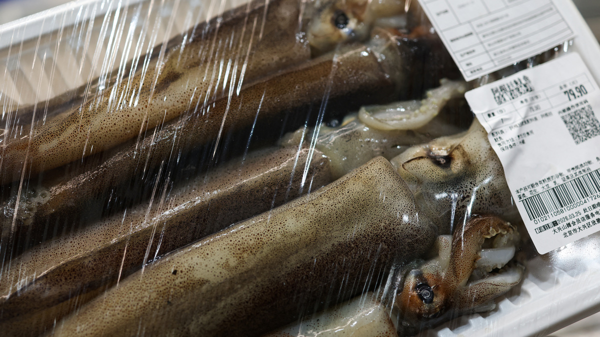 A pack of Argentine squid is placed in a fridge at a seafood section at a supermarket in Beijing, China March 26, 2026. REUTERS/Tingshu Wang