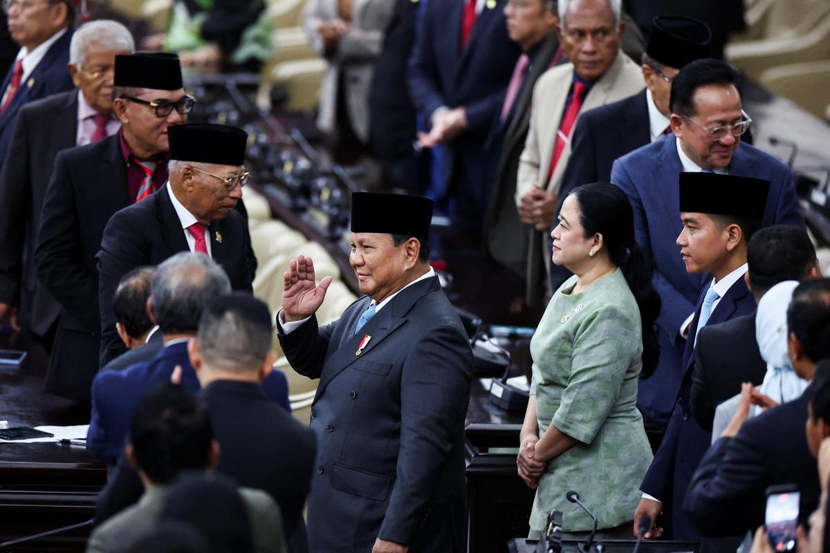 Indonesian President Prabowo Subianto gestures as he walks at the parliament building to deliver his speech on economic policies and the 2027 fiscal plan in Jakarta, Indonesia, May 20, 2026. REUTERS/Willy Kurniawan