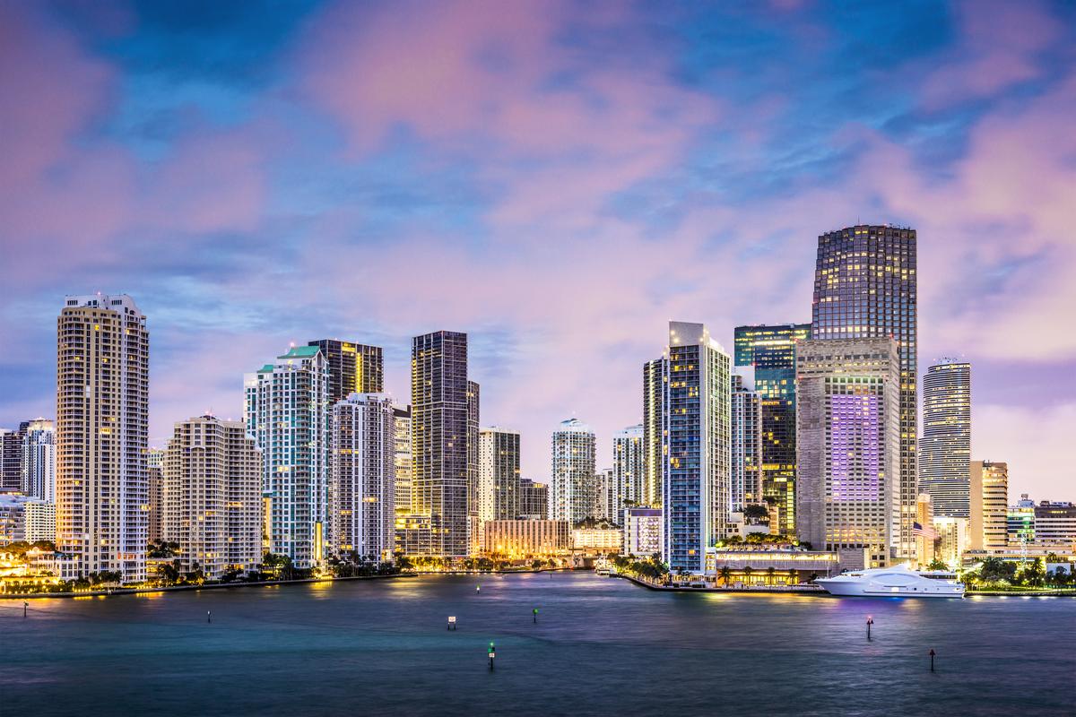  Stock image of the Miami skyline along Brickell Key and the Miami River. 