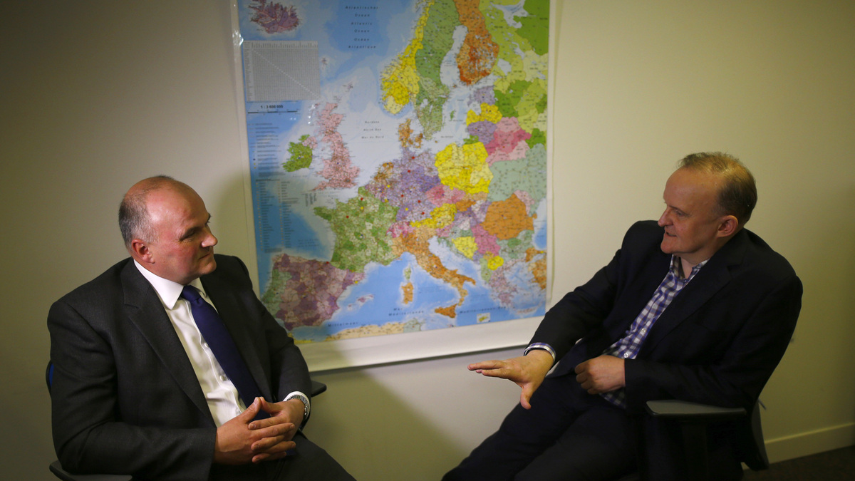 Brothers with opposing views on Europe Ian Baxter (R) and Nigel Baxter speak in the offices of Baxter Freight in Nottingham, Britain March 22, 2016. REUTERS/Darren Staples/File Photo