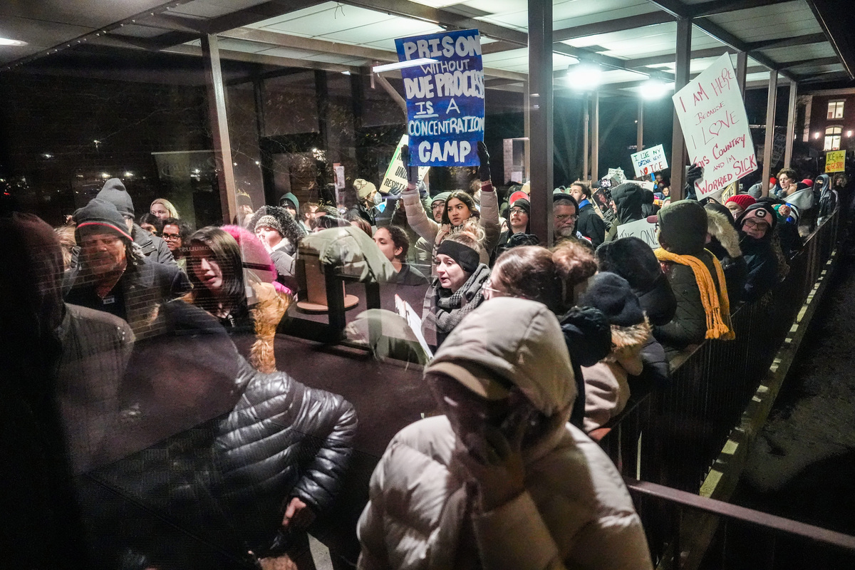 A large group of people are locked out of the city council meeting after protesting the proposed ICE warehouse detention center outside of Romulus City Hall, Monday, Feb. 23, 2026.
