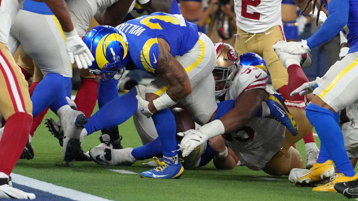  Oct 2, 2025; Inglewood, California, USA; San Francisco 49ers defensive tackle Alfred Collins (95) forces a fumble by Los Angeles Rams running back Kyren Williams (23) at the 1-yard line in the fourth quarter at SoFi Stadium. Mandatory Credit: Kirby Lee-Imagn Images | Kirby Lee-Imagn Images 