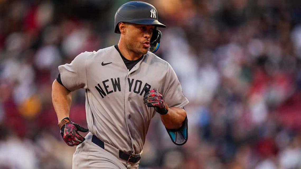  New York Yankees designated hitter Giancarlo Stanton (27) rounds the bases after hitting a home run against the Boston Red Sox in the second inning at Fenway Park. | David Butler II-Imagn Images 