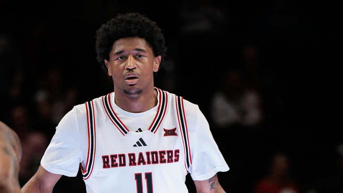  Mar 12, 2026; Kansas City, MO, USA; Texas Tech Red Raiders guard Jaylen Petty (11) brings the ball up court around Iowa State Cyclones guard Jamarion Batemon (1) during the first half at T-Mobile Center. Mandatory Credit: William Purnell-Imagn Images | William Purnell-Imagn Images 