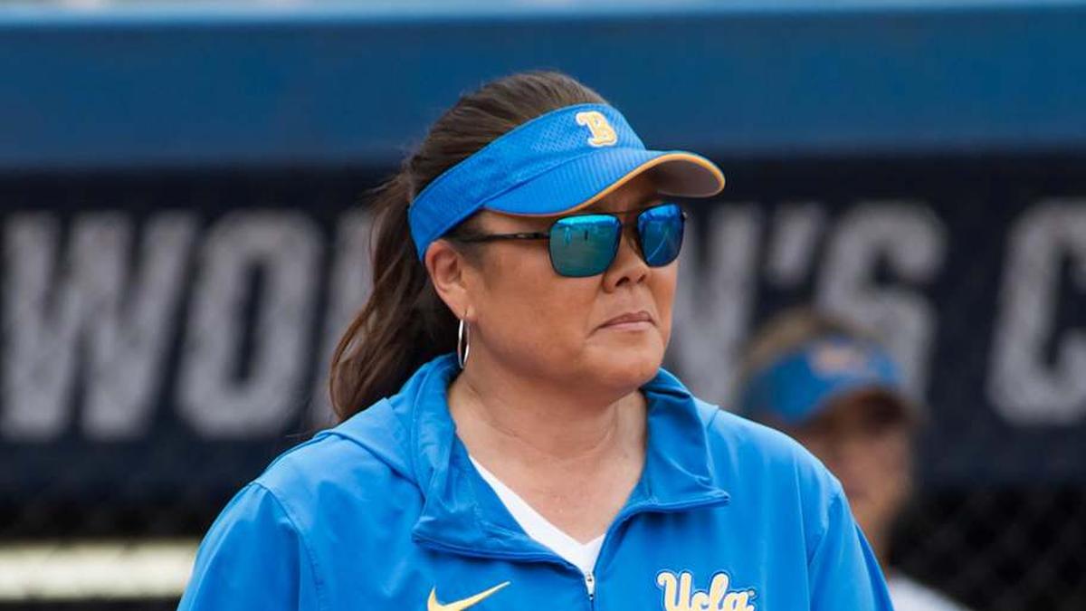  May 30, 2024; Oklahoma City, OK, USA; UCLA Bruins head coach Kelly Inouye-Perez walks to the pitcher's mound in the fifth inning against the Alabama Crimson Tide during a Women's College World Series softball game at Devon Park. Mandatory Credit: Brett Rojo-Imagn Images | Brett Rojo-Imagn Images 
