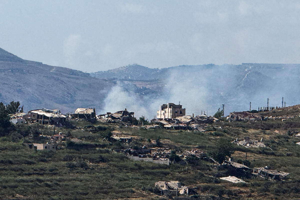 Smoke rises near destroyed structures in southern Lebanon, as seen from the Israeli side of the Israel-Lebanon border, in northern Israel, June 14, 2026. Picture taken with a mobile phone. REUTERS/Avi Ohayon