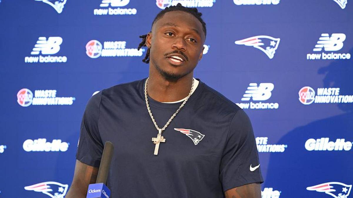  Jun 2, 2026; Foxborough, MA, USA; New England Patriots wide receiver A.J. Brown (1) speaks at a press conference after practice at the team's OTA at Gillette Stadium. Mandatory Credit: Eric Canha-Imagn Images | Eric Canha-Imagn Images 
