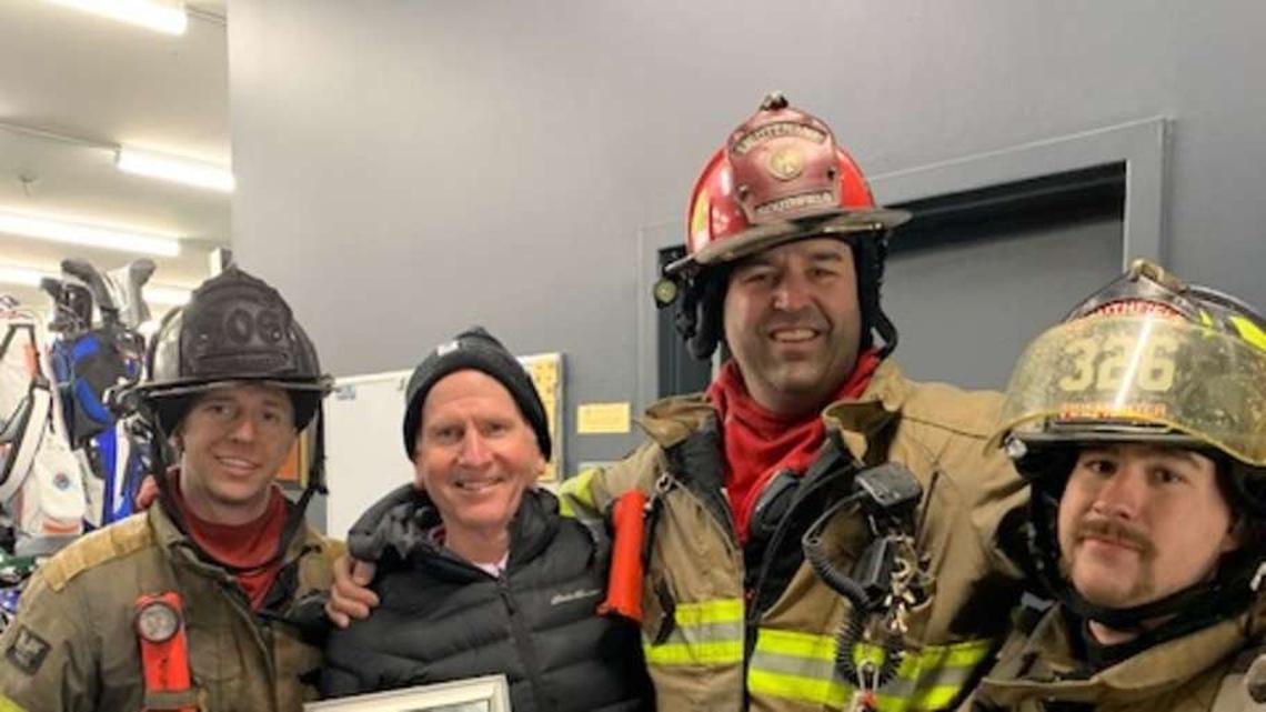  Southfield Fire Department firefighters salvaged a prized photo for head pro Steve Brady. | Janina Jacobs 