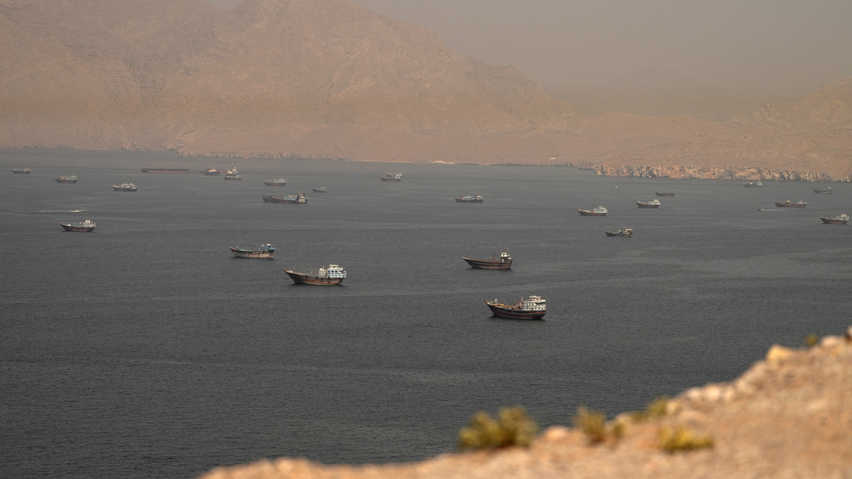 FILE PHOTO: Vessels at the Strait of Hormuz, as seen from Musandam, Oman, June 18, 2026. REUTERS/Stringer/File Photo