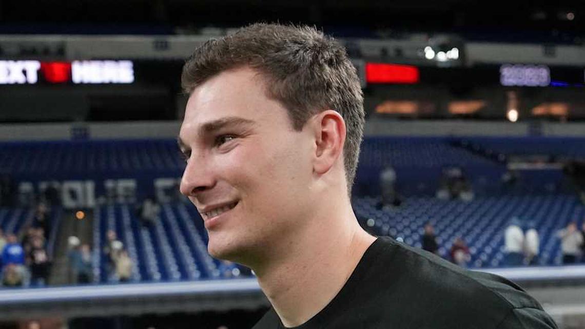  Feb 28, 2026; Indianapolis, IN, USA; Indiana quarterback Fernando Mendoza (QB11) looks on during the NFL Scouting Combine at Lucas Oil Stadium. Mandatory Credit: Kirby Lee-Imagn Images | Kirby Lee-Imagn Images 