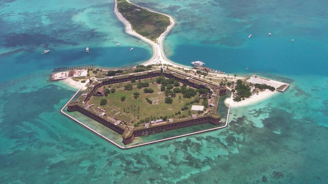Hexagonal Fort Jefferson, built on a sandy foundation 70 miles west of the Florida Keys, is the centerpiece of Dry Tortugas National Park.