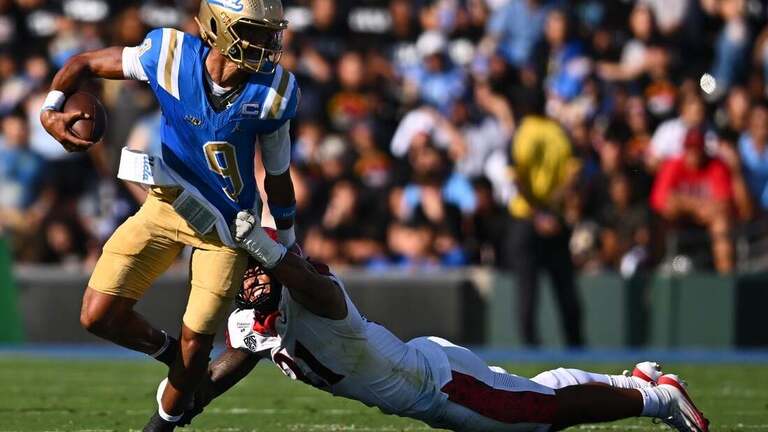 Wayne Knight runs for 3 scores to carry UCLA past San Diego State 