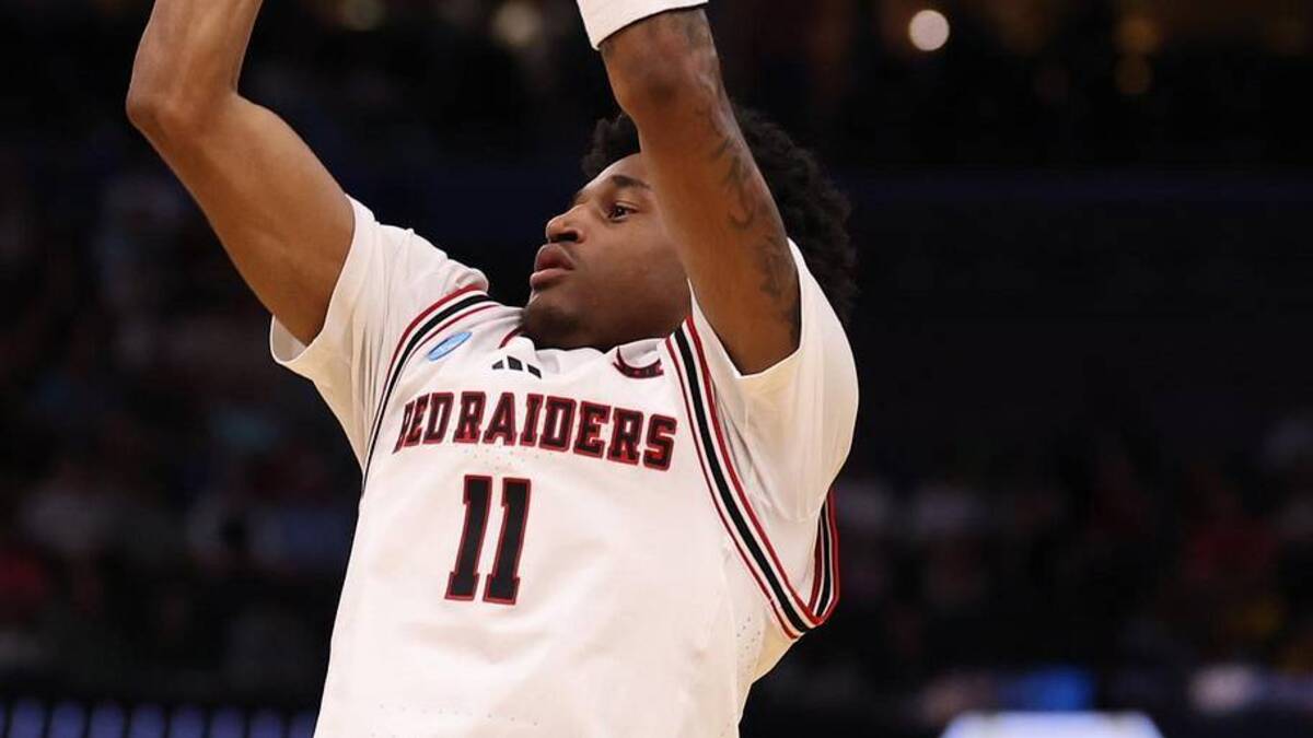  Mar 20, 2026; Tampa, FL, USA; Texas Tech Red Raiders guard Jaylen Petty (11) shoots against Akron Zips guard Evan Mahaffey (12) in the first half during a first round game of the men's 2026 NCAA Tournament at Benchmark International Arena. Mandatory Credit: Matt Pendleton-Imagn Images | Matt Pendleton-Imagn Images 