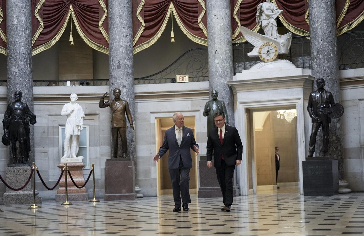 House Speaker Mike Johnson (R-La.), right, walks with King Charles III ahead of his address to a joint meeting of Congress in honor of the 250th anniversary of American independence at the Capitol in Washington, on Tuesday, April 28, 2026. (Salwan Georges/The New York Times)