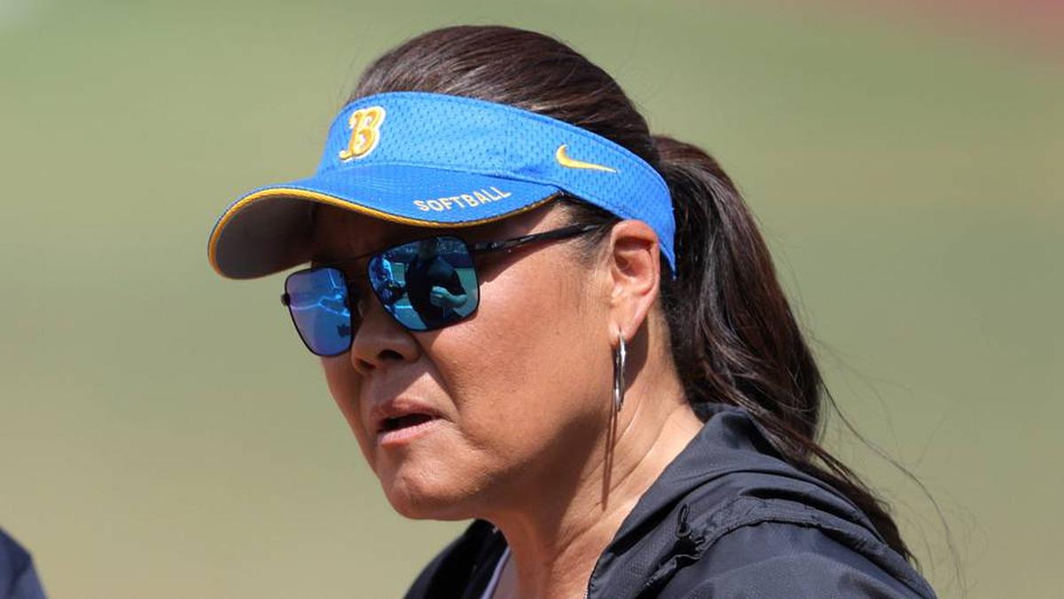  UCLA coach Kelly Inouye-Perez talks with an official during a Women's College World Series softball game between the University of Oklahoma Sooners (OU) and the UCLA Bruins at Devon Park in Oklahoma City, Saturday, June 1, 2024. Oklahoma won 1-0. | BRYAN TERRY/THE OKLAHOMAN / USA TODAY NETWORK 