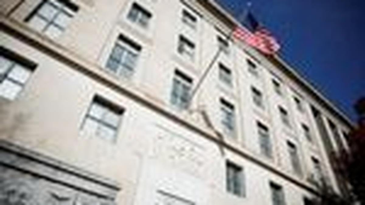 FILE PHOTO: A U.S. flag flutters at the Federal Trade Commission (FTC) headquarters in Washington, D.C., U.S., November 24, 2024. REUTERS/Benoit Tessier/File Photo
