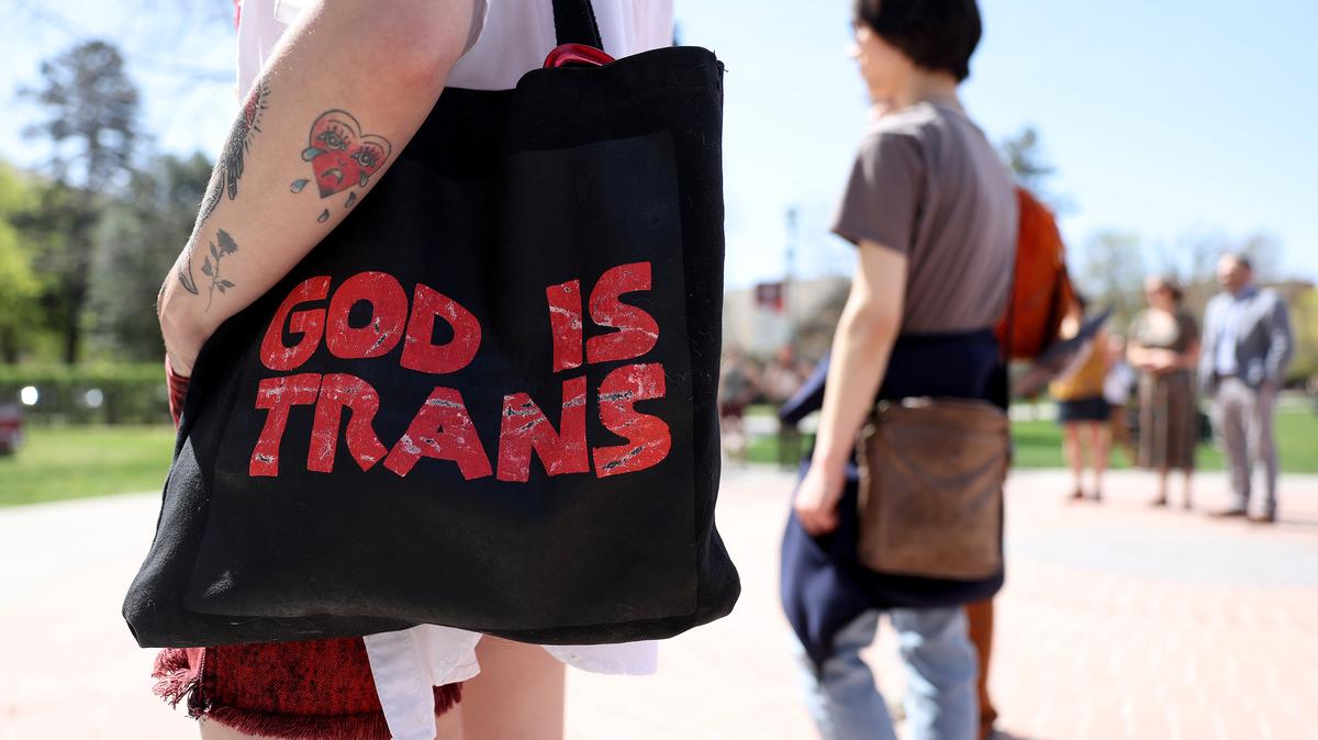 A transgender rights activist holds a bad during a demonstration on the University of Montana campus on May 03, 2023 in Missoula, Montana. Dozens of students and transgender rights activists staged a demonstration on the University of Montana campus to protest the censure of transgender Montana state Rep. Zooey Zephyr by House Republicans in the Montana State Legislature for breaking House rules of decorum by saying state legislators would have "blood on your hands" if a transgender youth care ban was passed. (Justin Sullivan/Getty Images/TNS)