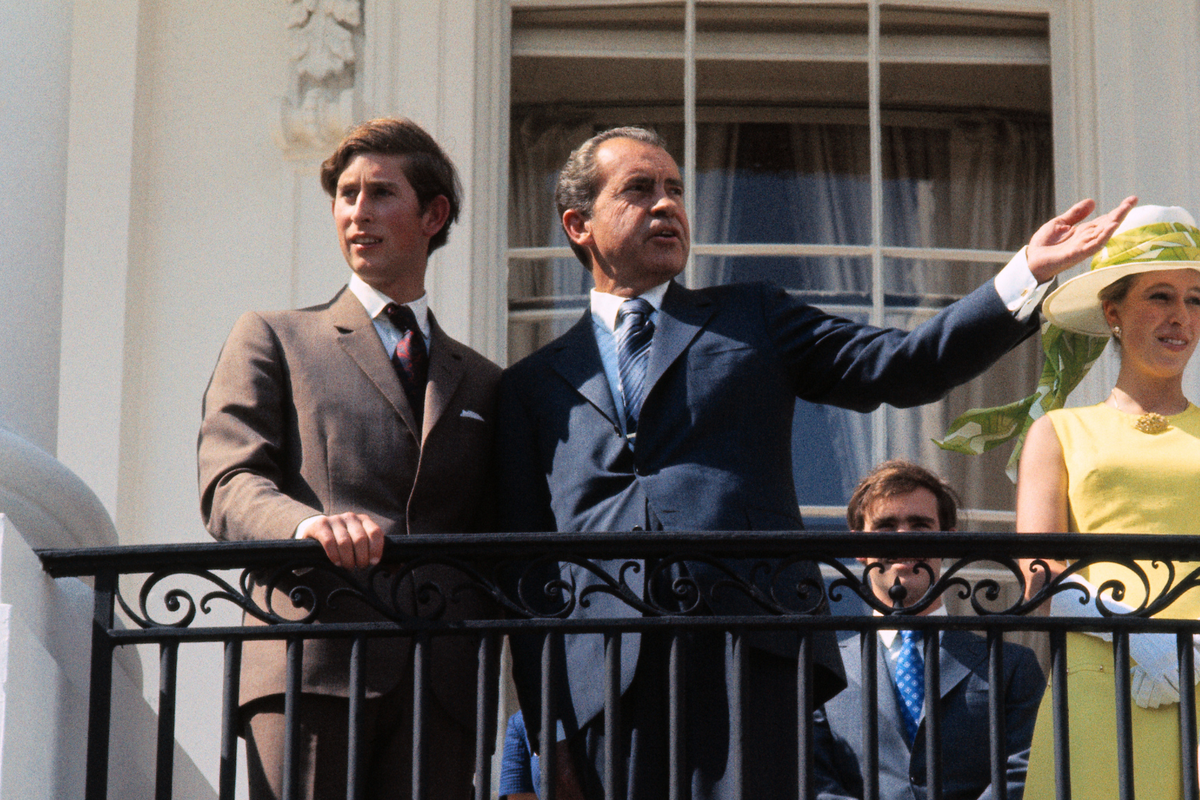  President Nixon, center, welcomes Prince Charles and Princess Anne on the balcony of the South Portico of the White House in 1970. 