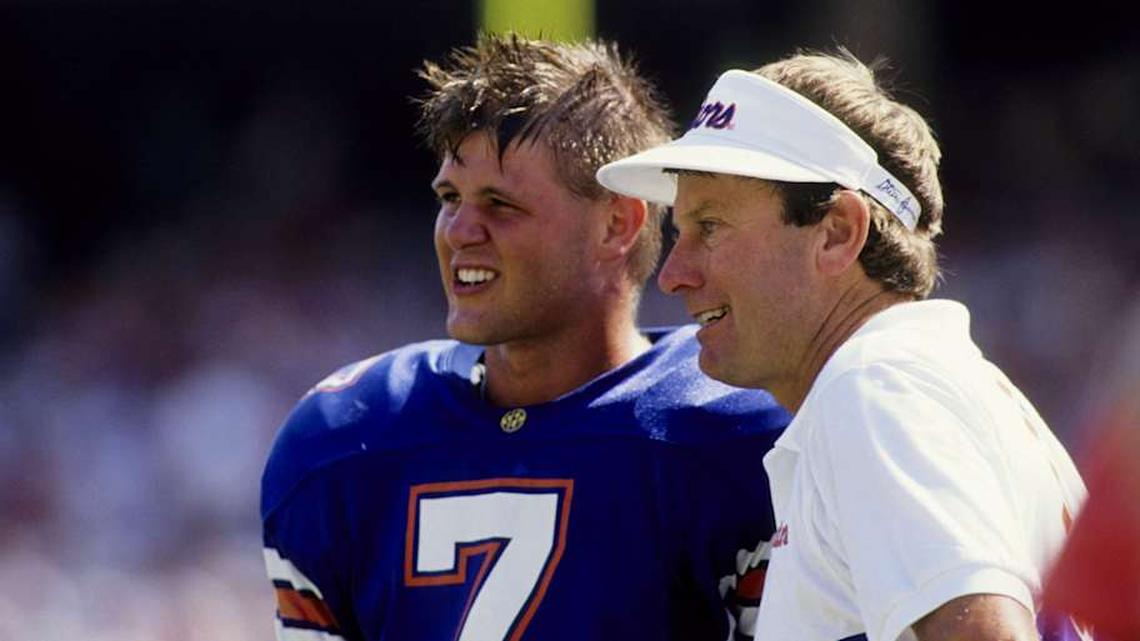  Florida Gators head coach Steve Spurrier (right) and quarterback Danny Wuerffel (7) talk on the sidelines during the 1995 season. | RVR Photos-Imagn Images 