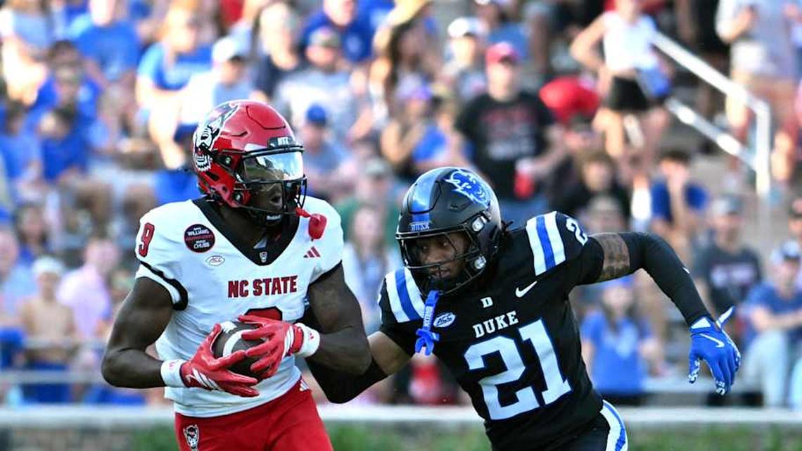  Sep 20, 2025; Durham, North Carolina, USA; North Carolina State Wolfpack wide receiver Terrell Anderson (9) runs the ball during the second quarter against Duke Blue Devils cornerback Landan Callahan (21) at Wallace Wade Stadium. Mandatory Credit: Zachary Taft-Imagn Images | Zachary Taft-Imagn Images 