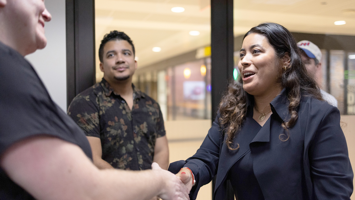 Illinois 4th Congressional District candidate Mayra Macías, right, shakes hands with a supporter ahead of a hearing with the Illinois State Board of Elections in Chicago’s Loop on June 26, 2026. Macías met with the board of elections to respond to questions about legitimate signatures on her candidacy petition. (Josh Boland/Chicago Tribune/TNS)