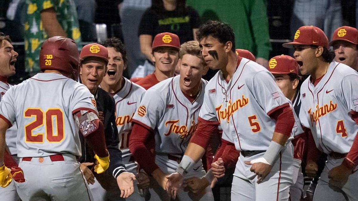  USC celebrates a home run by Isaac Cadena (20) as the Oregon Ducks host the USC Trojans on May 14, 2026, in Eugene, Oregon. | Ben Lonergan/The Register-Guard / USA TODAY NETWORK via Imagn Images 