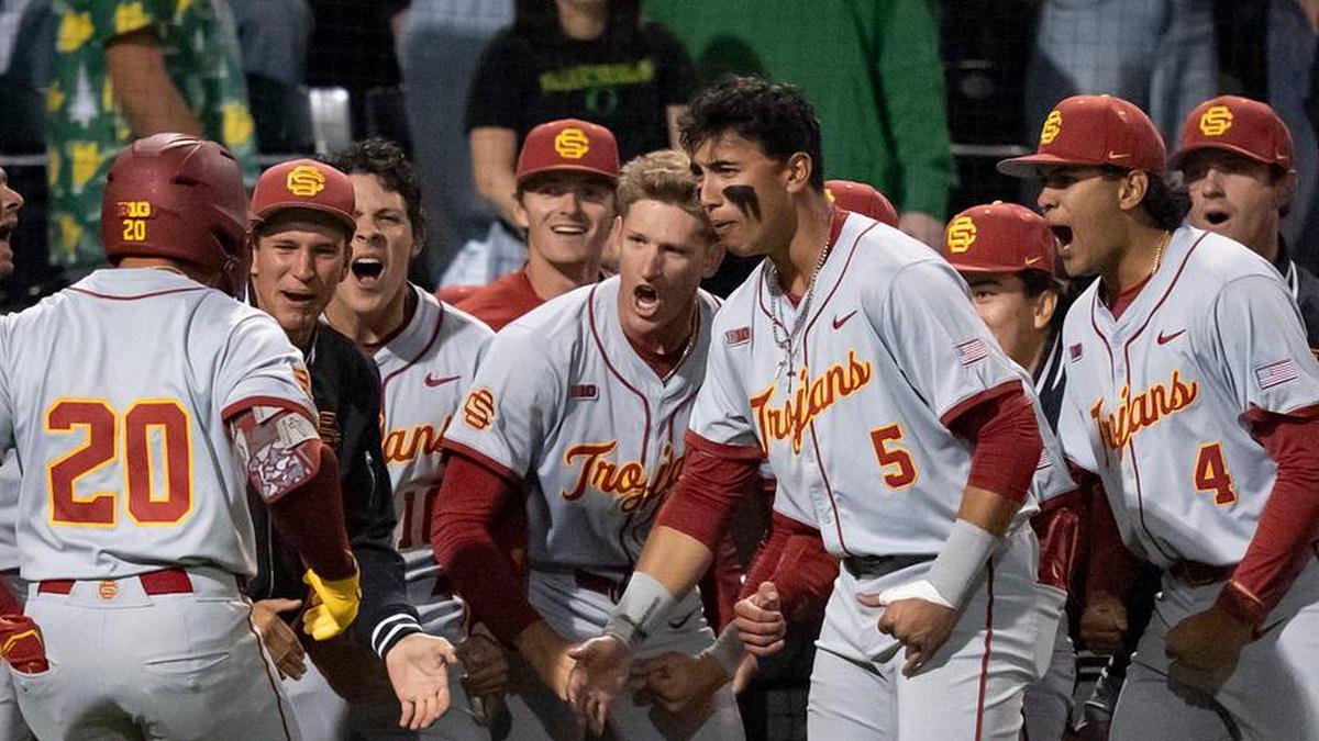  USC celebrates a home run by Isaac Cadena (20) as the Oregon Ducks host the USC Trojans on May 14, 2026, in Eugene, Oregon. | Ben Lonergan/The Register-Guard / USA TODAY NETWORK via Imagn Images 
