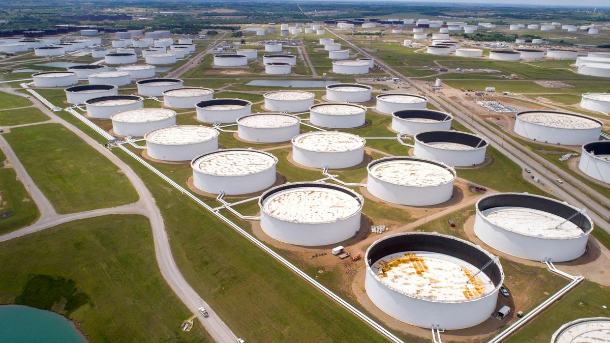 FILE PHOTO: Crude oil storage tanks are seen in an aerial photograph at the Cushing oil hub in Cushing, Oklahoma, U.S. April 21, 2020. REUTERS/Drone Base/File Photo