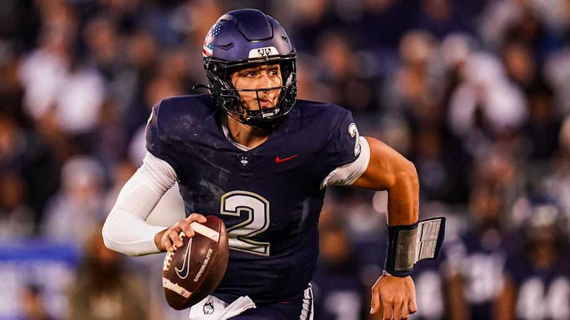  Nov 8, 2025; East Hartford, Connecticut, USA; UConn Huskies quarterback Joe Fagnano (2) runs the ball against the Duke Blue Devils in the second quarter at Pratt & Whitney Stadium at Rentschler Field. Mandatory Credit: David Butler II-Imagn Images | David Butler II-Imagn Images 