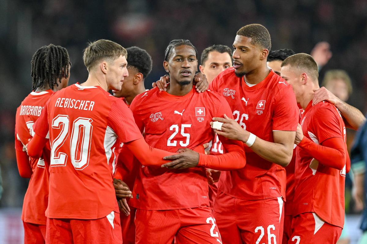  Joel Monteiro celebrates after scoring his team's third goal with teammates during the international friendly match between Switzerland and Germany. Photo by Harry Langer/DeFodi Images/DeFodi via Getty Images