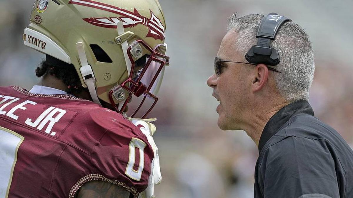  Sep 6, 2025; Tallahassee, Florida, USA; Florida State Seminoles head coach Mike Norvell speaks to safety Earl Little Jr. (0) during the second half against the East Texas A&M Lions at Doak S. Campbell Stadium. Mandatory Credit: Melina Myers-Imagn Images | Melina Myers-Imagn Images 