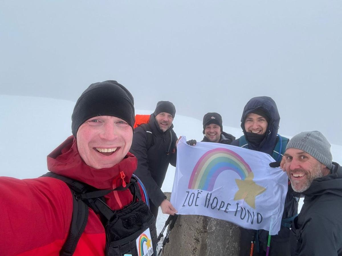  Nathan and his friends during the Three Peaks challenge. (Nathan Norris via SWNS) 