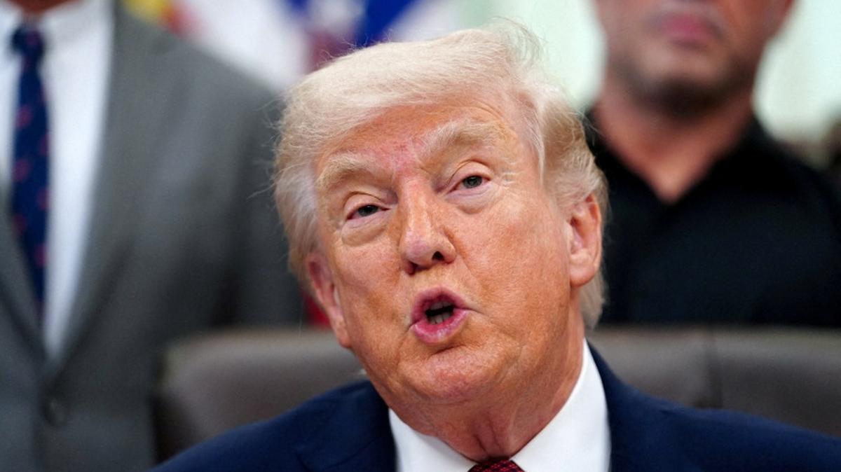 FILE PHOTO: U.S. President Donald Trump speaks about research into mental health treatments in the Oval Office of the White House in Washington, D.C., April 18, 2026. REUTERS/Nathan Howard/File Photo