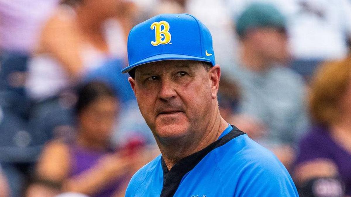  Jun 16, 2025; Omaha, Neb, USA; UCLA Bruins head coach John Savage walks off the field before the game against the LSU Tigers at Charles Schwab Field. Mandatory Credit: Dylan Widger-Imagn Images | Dylan Widger-Imagn Images 