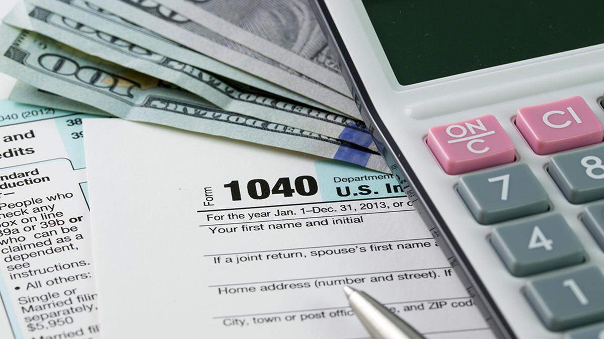 Tax documents and a calculator.