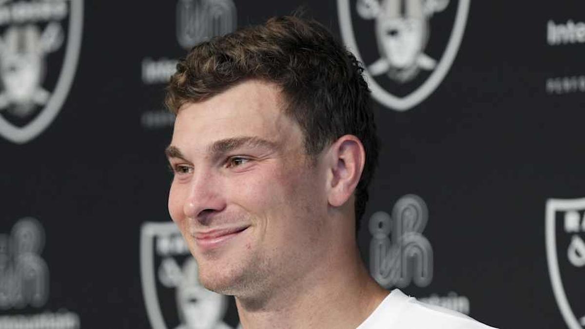  May 2, 2026; Henderson, NV, USA; Las Vegas Raiders quarterback Fernando Mendoza (15) speaks during a news conference at the team's Rookie Minicamp at Intermountain Health Performance Center. Mandatory Credit: Candice Ward-Imagn Images | Candice Ward-Imagn Images 