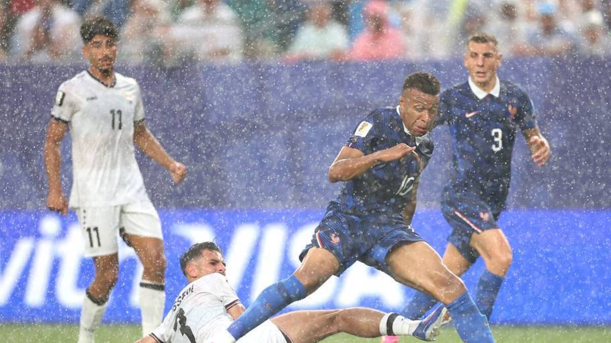  The game was played under heavy rain late in the first half. | Kevin C. Cox/Getty Images 