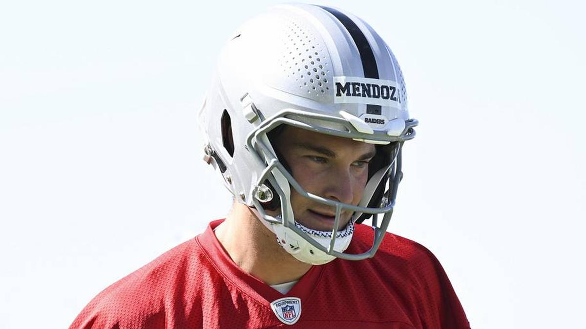  May 20, 2026; Henderson, NV, USA; Las Vegas Raiders quarterback Fernando Mendoza (15) stretches during organized team activities at Intermountain Health Performance Center. Mandatory Credit: Candice Ward-Imagn Images | Candice Ward-Imagn Images 