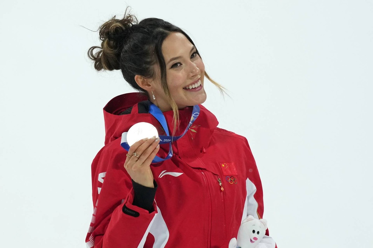  Feb 16, 2026; Livigno, Italy; Silver medalist Ailing Eileen Gu of the People's Republic of China celebrates during the medal ceremony for the women's big air final during the Milano Cortina 2026 Olympic Winter Games at Livigno Snow Park. Mandatory Credit: Joe Camporeale-Imagn Images 