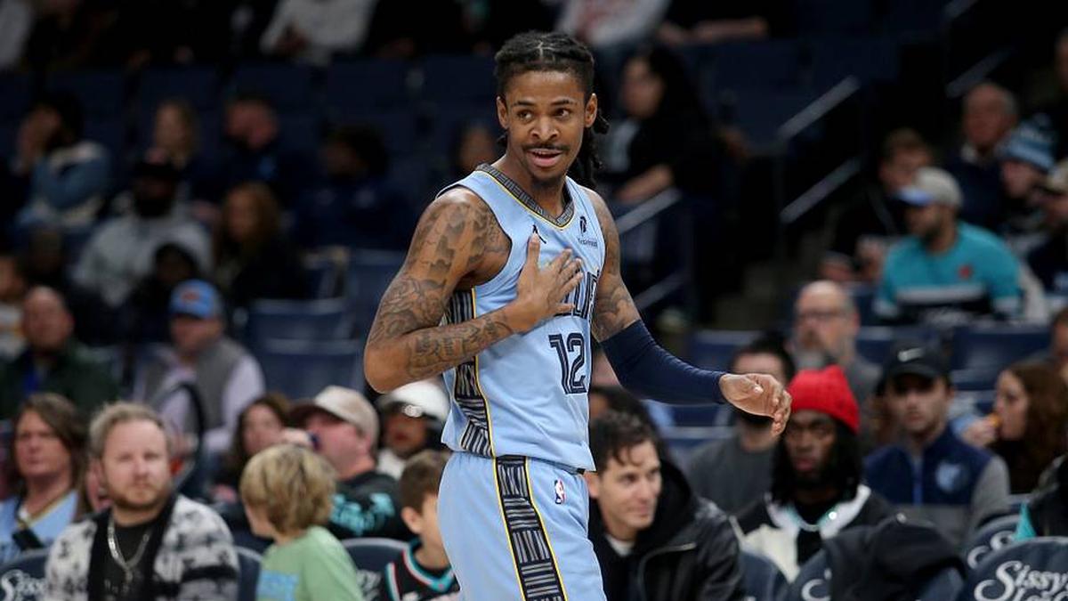  Jan 21, 2026; Memphis, Tennessee, USA; Memphis Grizzlies guard Ja Morant (12) reacts during the first quarter against the Atlanta Hawks at FedExForum. | Petre Thomas-Imagn Images 