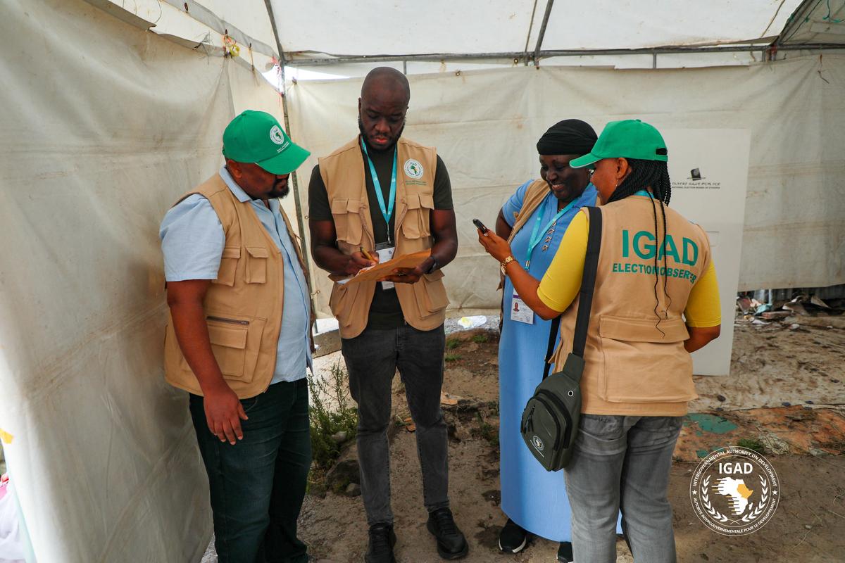 Dr. Specioza Wandira Kazibwe, Head of the IGAD Election Observer Mission, talks to her colleagues at a polling station during the parliamentary and regional elections in Addis Ababa, Ethiopia, June 1, 2026. The Intergovernmental Authority on Development (IGAD)/Handout via REUTERS
