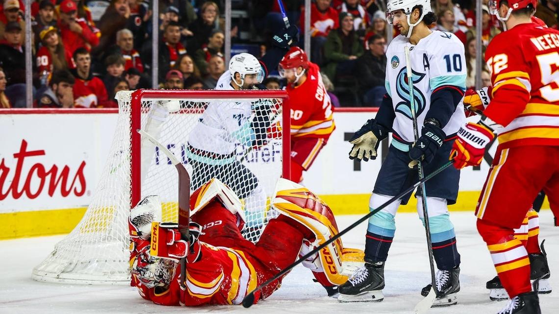 Kraken tote teeny playoff hopes into clash with Flames 