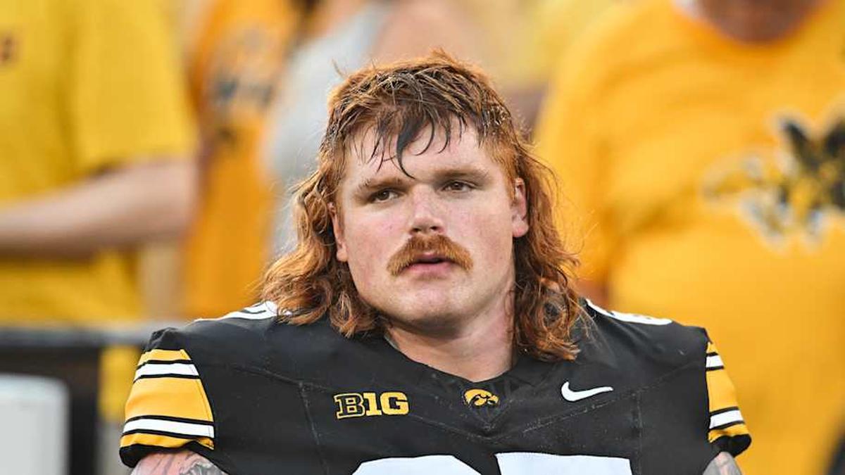  Sep 13, 2025; Iowa City, Iowa, USA; Iowa Hawkeyes offensive lineman Gennings Dunker (67) looks on before the game against the Massachusetts Minutemen at Kinnick Stadium. Mandatory Credit: Jeffrey Becker-Imagn Images | Jeffrey Becker-Imagn Images 