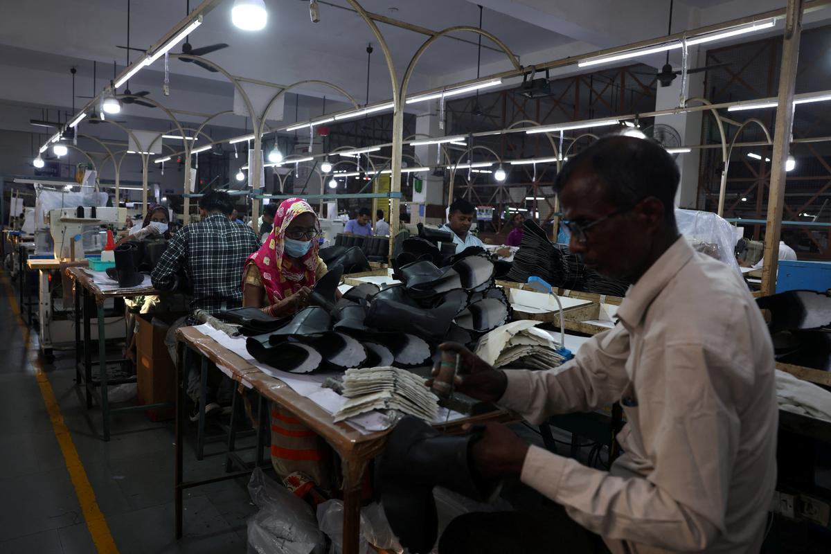Workers make shoes inside a leather factory of Superhouse Group in Kanpur, India, May 12, 2026. REUTERS/Bhawika Chhabra
