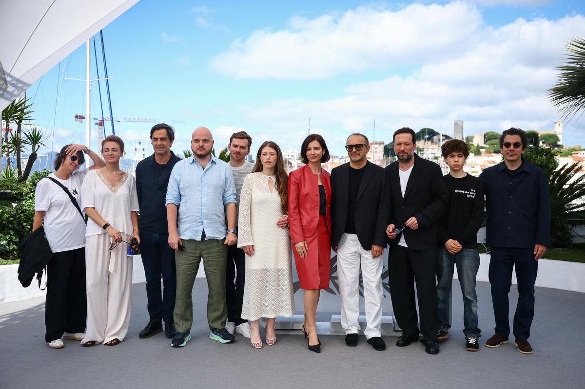 Director Andrey Zvyagintsev, cast members Boris Kudrin, Iris Lebedeva, Dmitriy Mazurov, Varvara Shmykova, Yuriy Zavalnyouk, producers Charles Gillibert, Nathanael Karmitz and guests pose during a photocall for the film "Minotaur" (Minotaure) in competition at the 79th Cannes Film Festival in Cannes, France, May 20, 2026. REUTERS/Sarah Meyssonnier