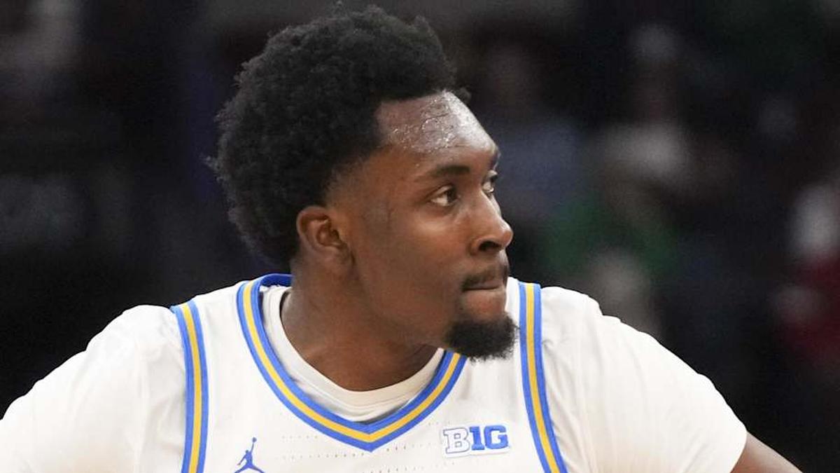  Mar 14, 2026; Chicago, IL, USA; UCLA Bruins center Xavier Booker (1) reacts after making a three point basket against the Purdue Boilermakers during the first half at United Center. Mandatory Credit: David Banks-Imagn Images | David Banks-Imagn Images 